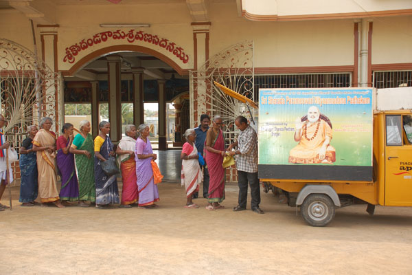 Distribution of Food Packets at Various Temples in Guntur